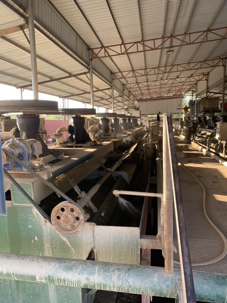 Rows of flotation cells under the roof of the processing plant